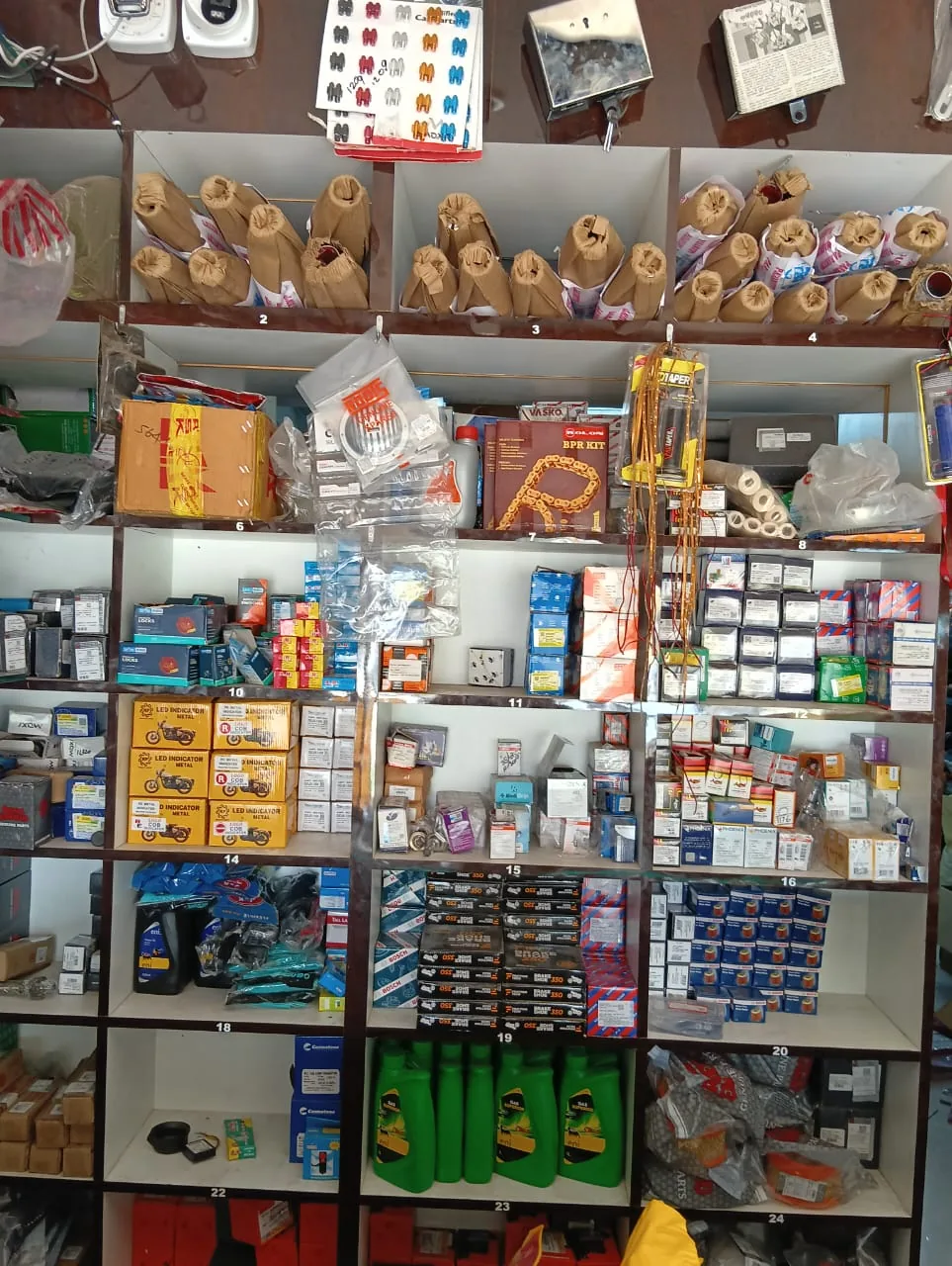 Spare parts and accessories displayed inside the SMC Autos shop